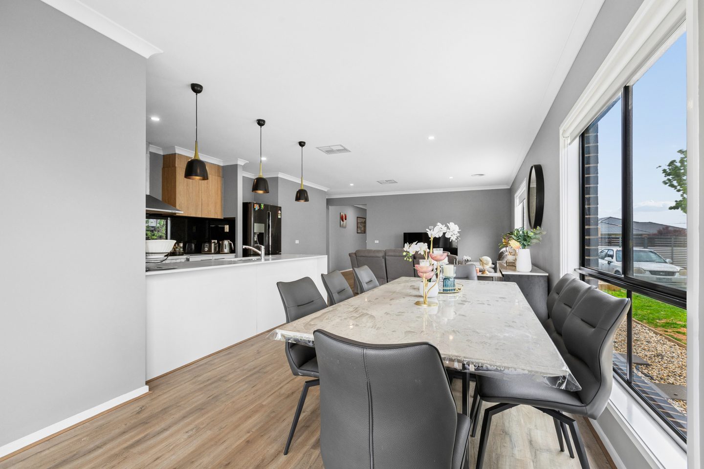 Dining area beside the kitchen and windows