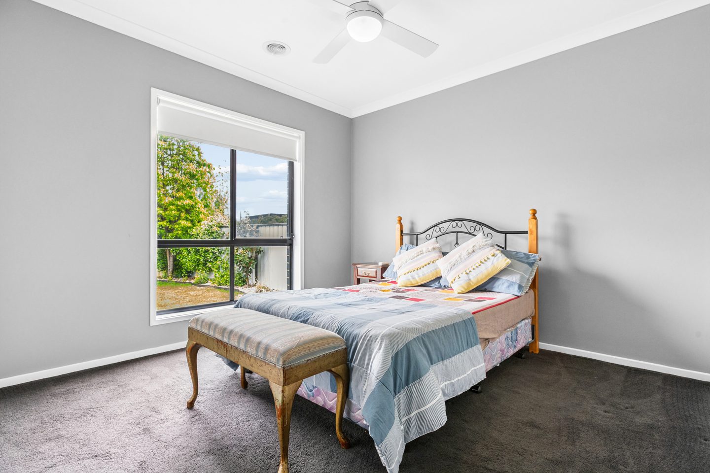 Bedroom with a garden-facing window
