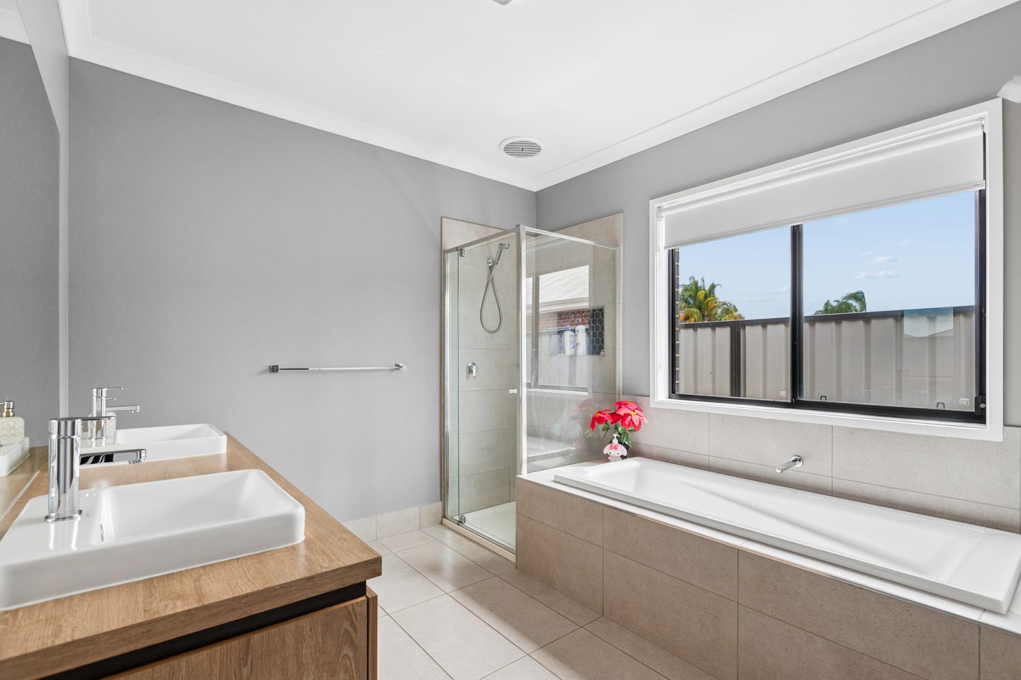 Main bathroom with bath and shower