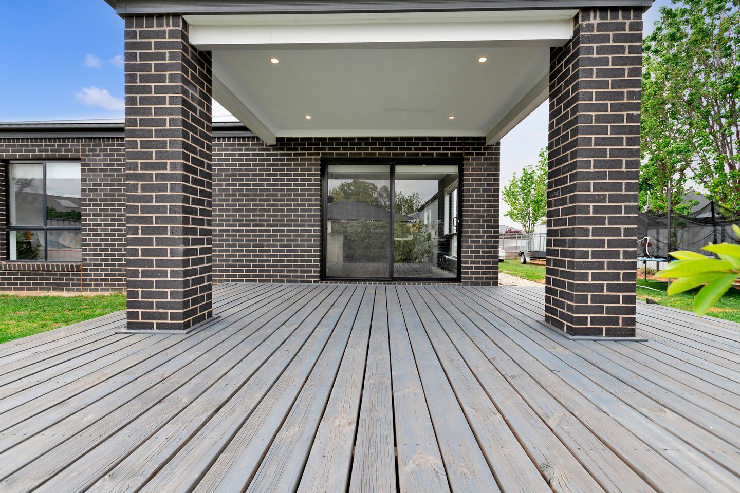 Covered deck and rear sliding doors