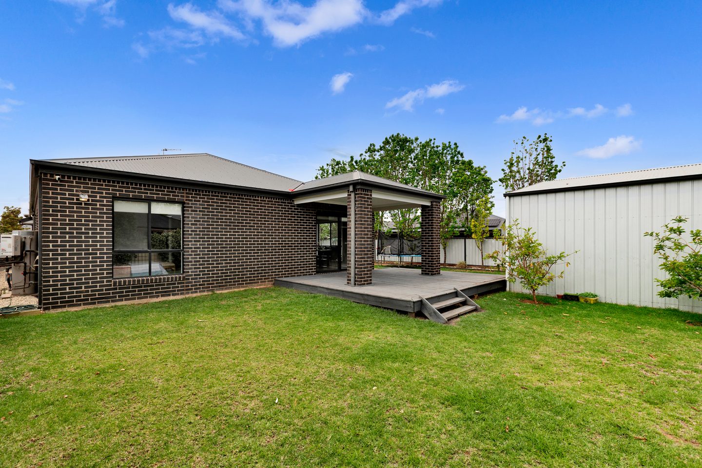 Rear lawn, deck and shed