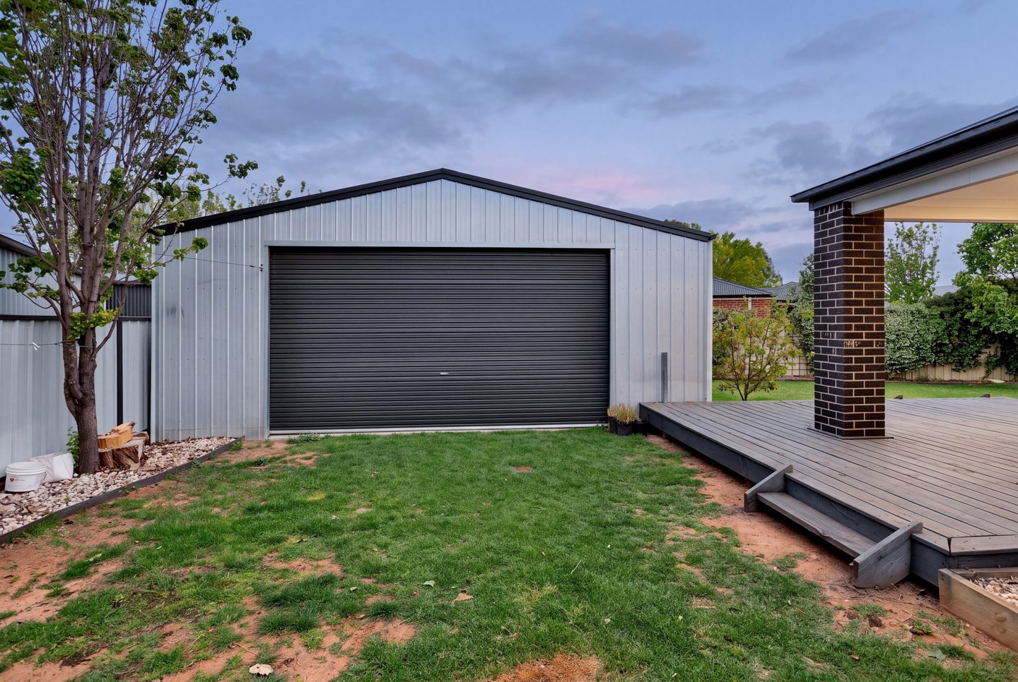 Shed and deck at dusk